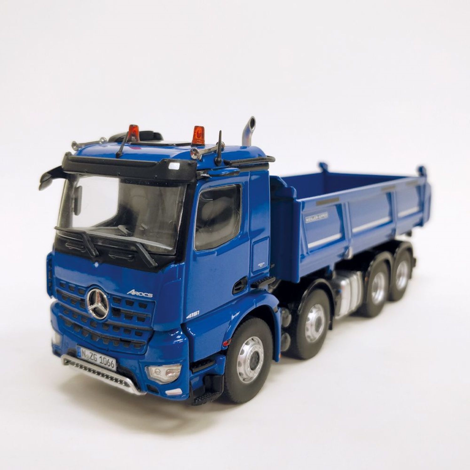 1066/20 - NZG - Mercedes-Benz Arocs M 8x4 Meiller Kipper - blau -