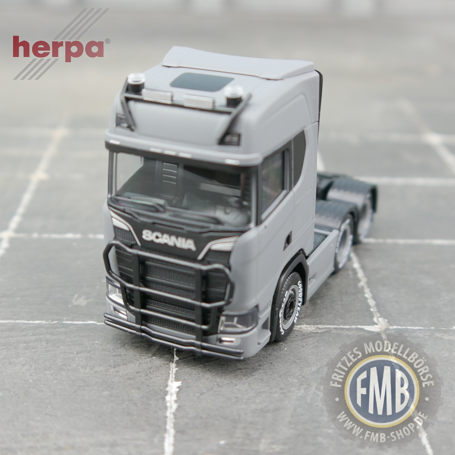 951159 - Herpa - Scania CS Highline 6x2 truck tractor with black attachments, matt nardo gray