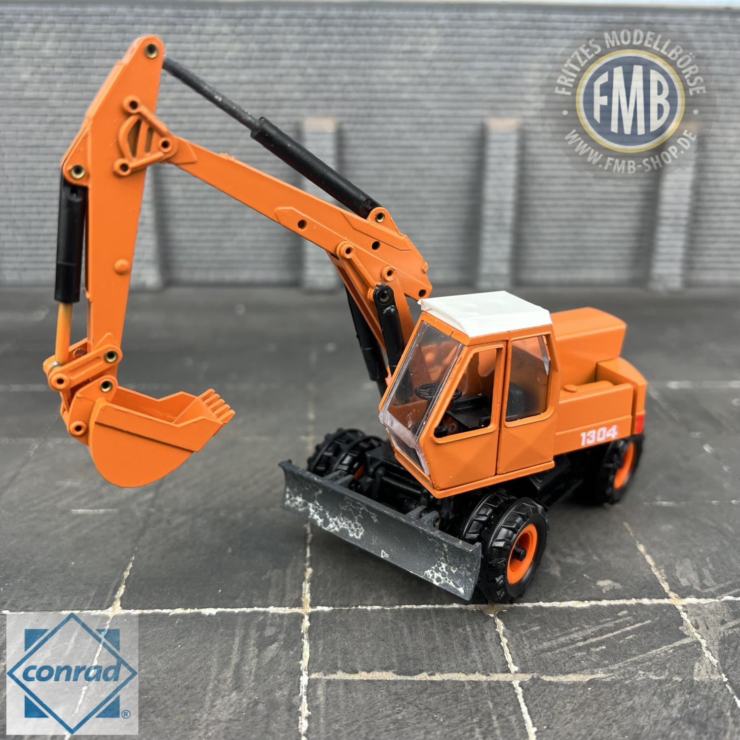 2904/01 - Conrad - Atlas 1304 mobile excavator, silver