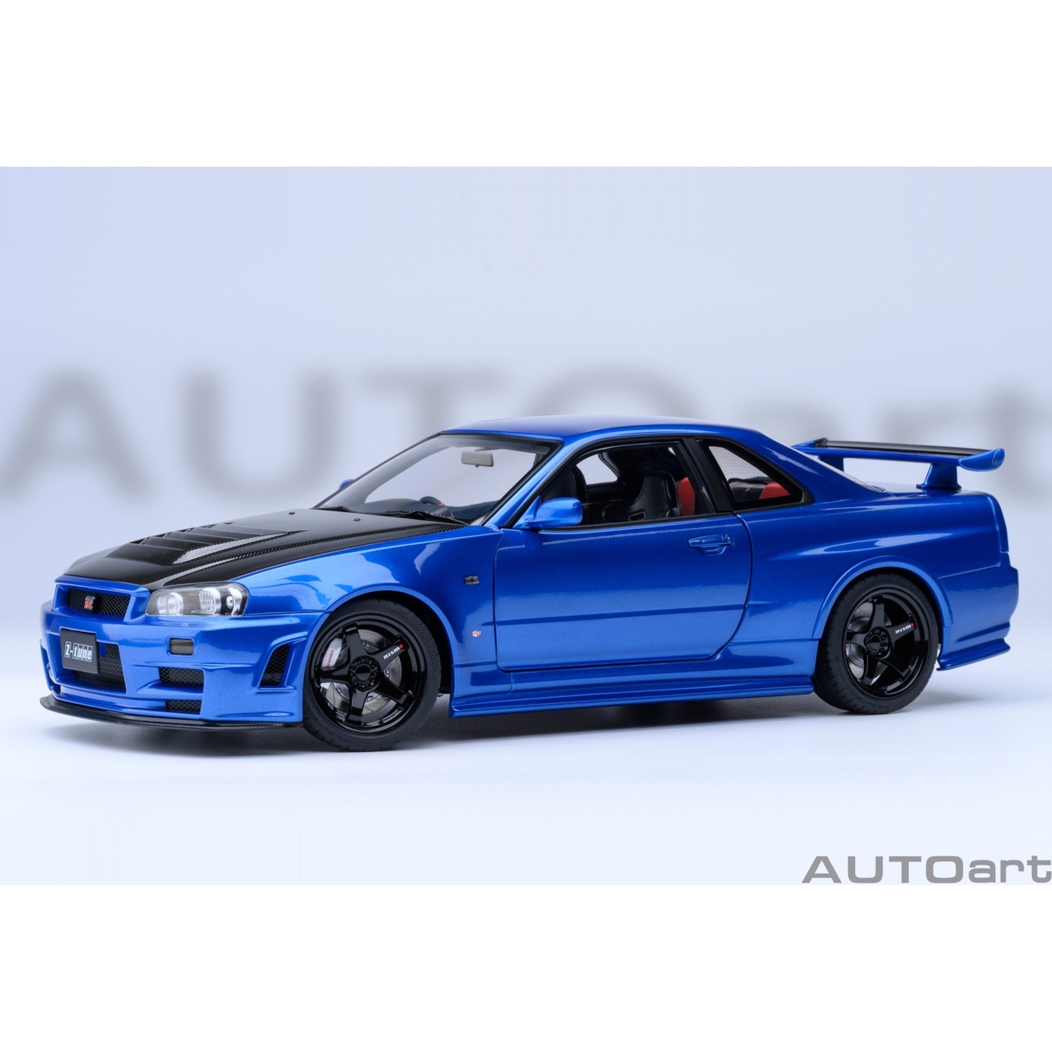 73460 - Autoart - Nissan Skyline GT-R (R34) Z-tune, bayside blue with carbon bonnet