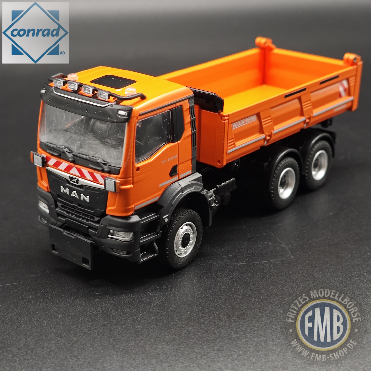 81165/02 - Conrad - MAN TGS NN four-wheel drive tipper with loading crane, anthracite