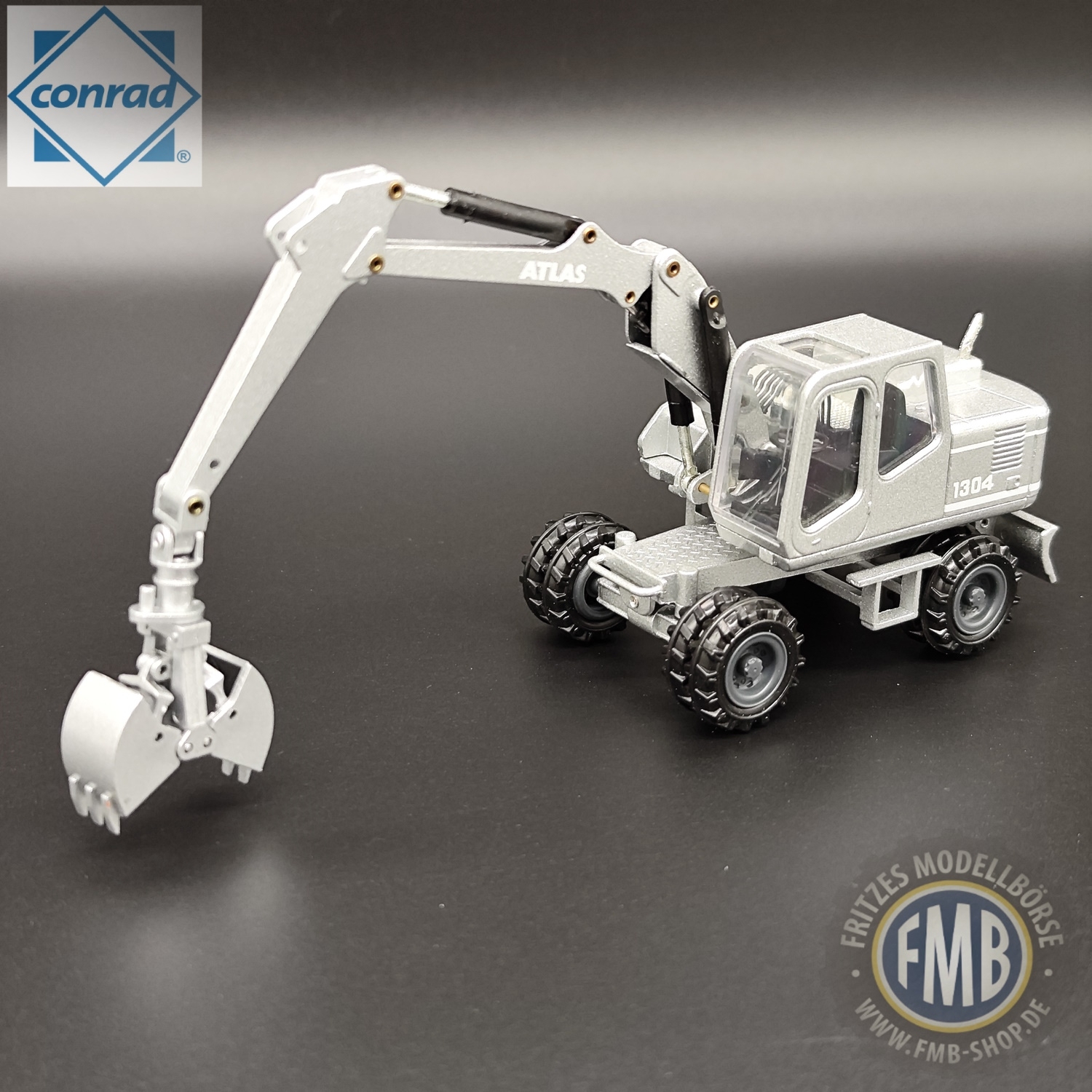 2904/01 - Conrad - Atlas 1304 mobile excavator, silver