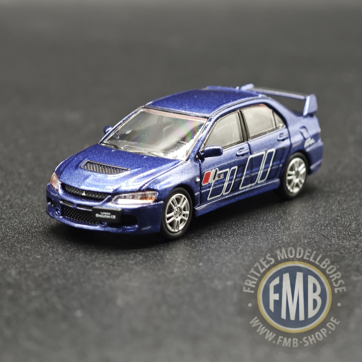 64101 - Micro City 87 - Mitsubishi Lancer Evo9, blau metallic - Dekor