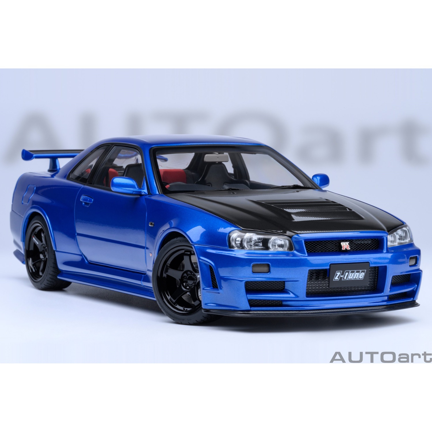 73460 - Autoart - Nissan Skyline GT-R (R34) Z-tune, bayside blau mit Carbon-Motorhaube