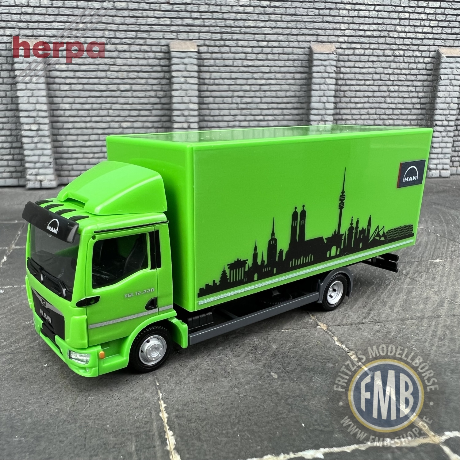 951296 - Herpa - MAN TGL CC 12.220 Koffer-LKW, grün