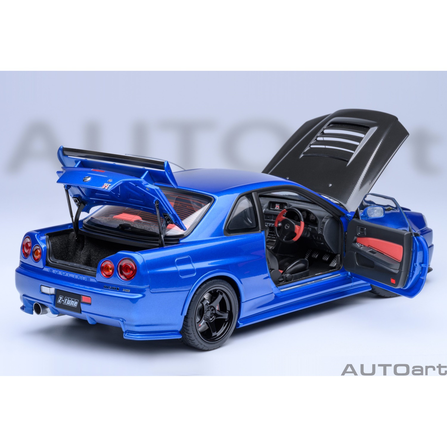 73460 - Autoart - Nissan Skyline GT-R (R34) Z-tune, bayside blau mit Carbon-Motorhaube