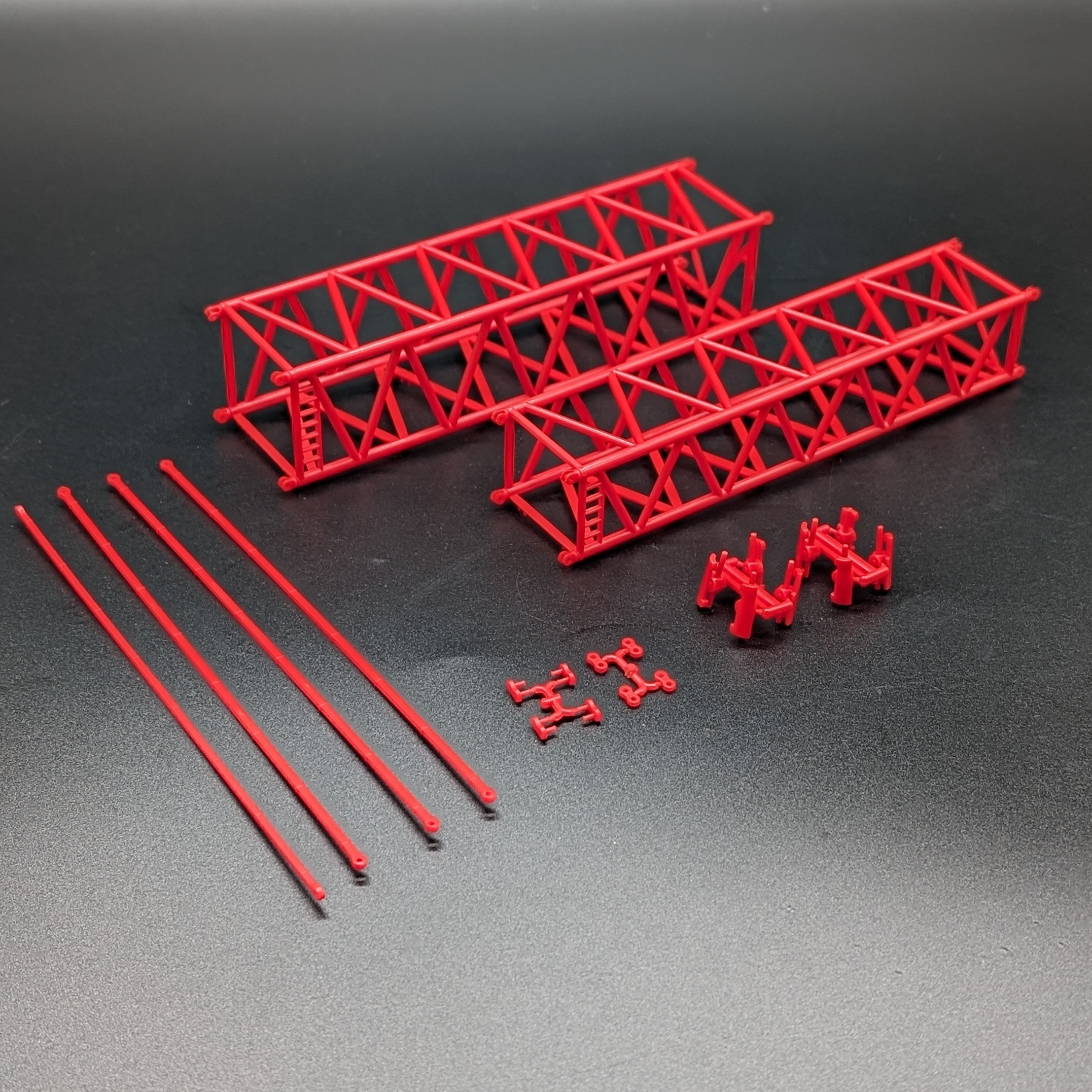 - Herpa - Liebherr LR 1600 lattice mast pieces for S and L booms in red for Riga Mainz and Mammoet.