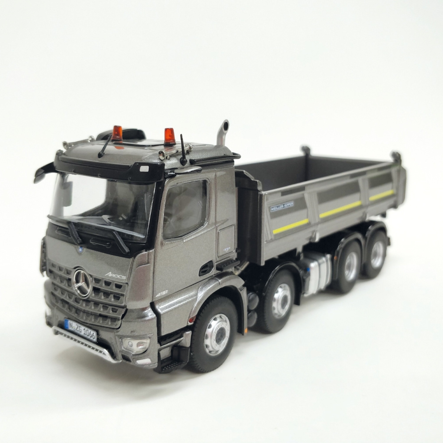 1066/55 - NZG - Mercedes-Benz Arocs M 8x4 Meiller Kipper - silbergrau -