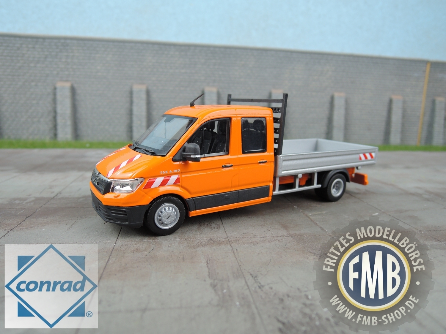 1616/0 - Conrad - MAN TGE 4.180 double cab , orange