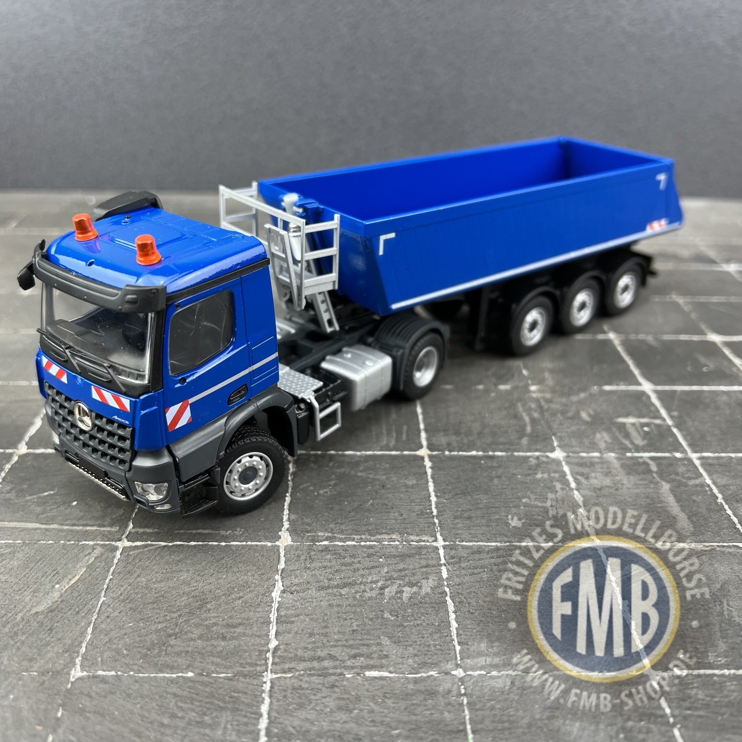 78202/03 - Conrad - Mercedes-Benz Arocs M 2axle with 3axle tipptrailer, blue