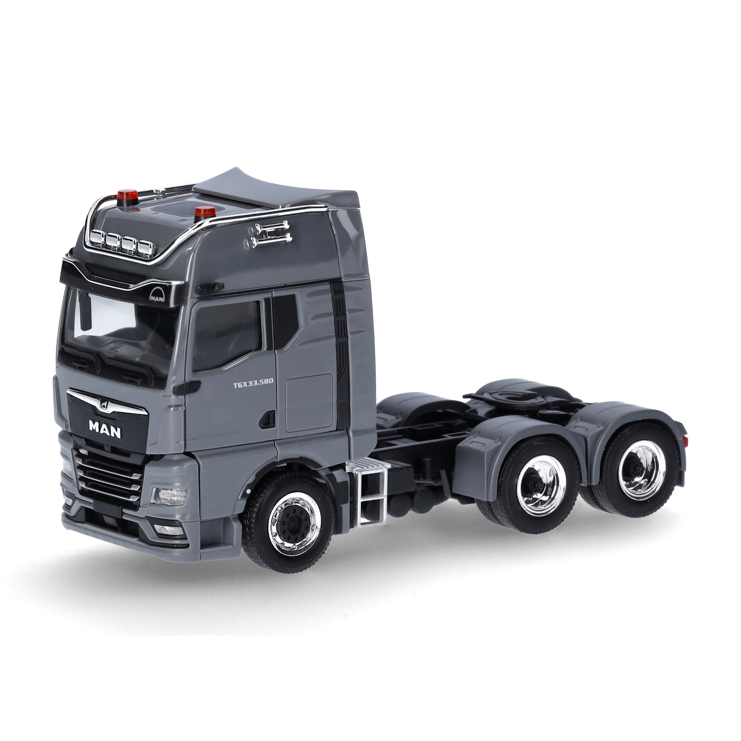 954488 - Herpa - MAN TGX GX 33.580 Individual 6x4 3achs Zugmaschine, nardograu