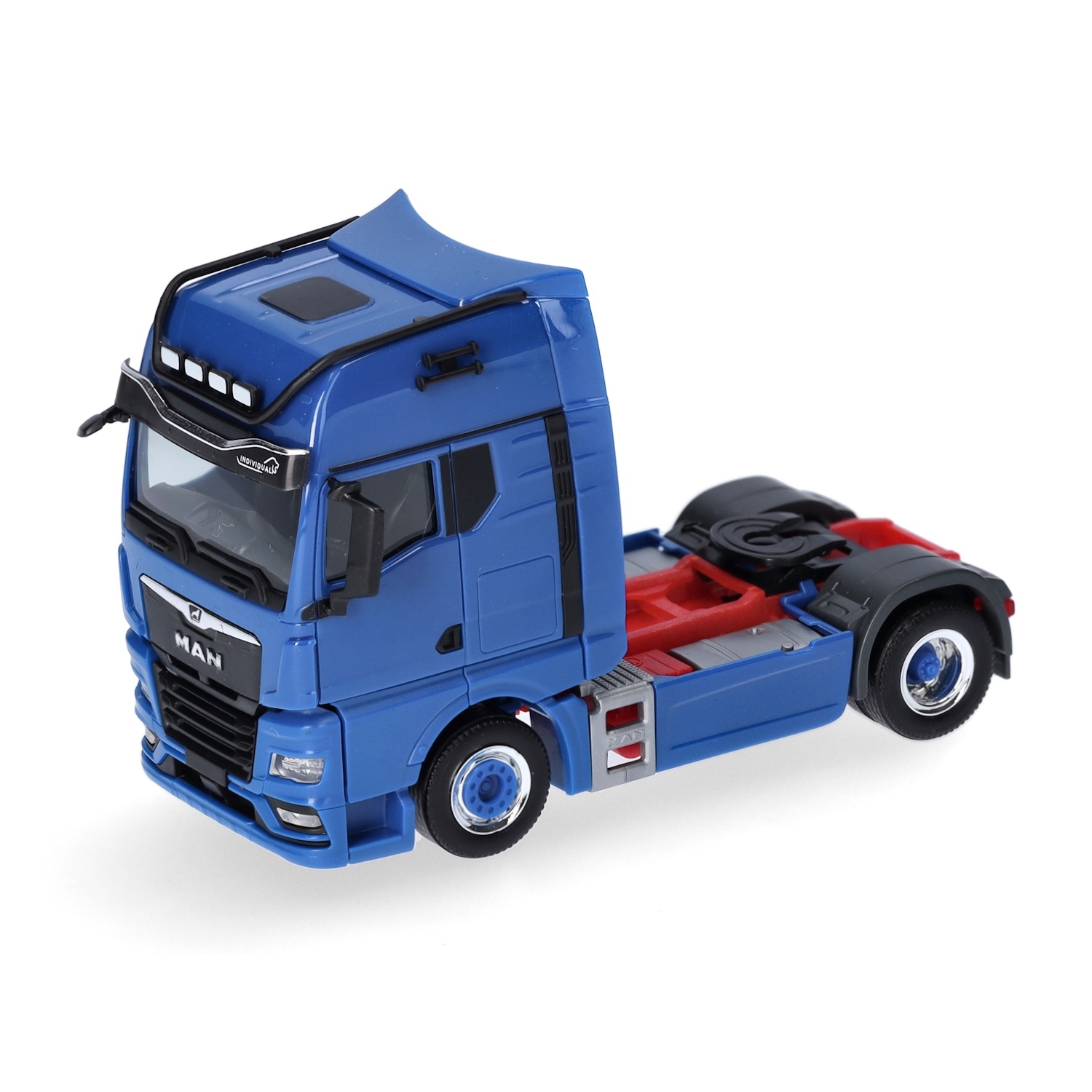 313711-003 - Herpa - MAN TGX GX Individual Zugmaschine mit schwarzen Anbauteilen, enzianblau