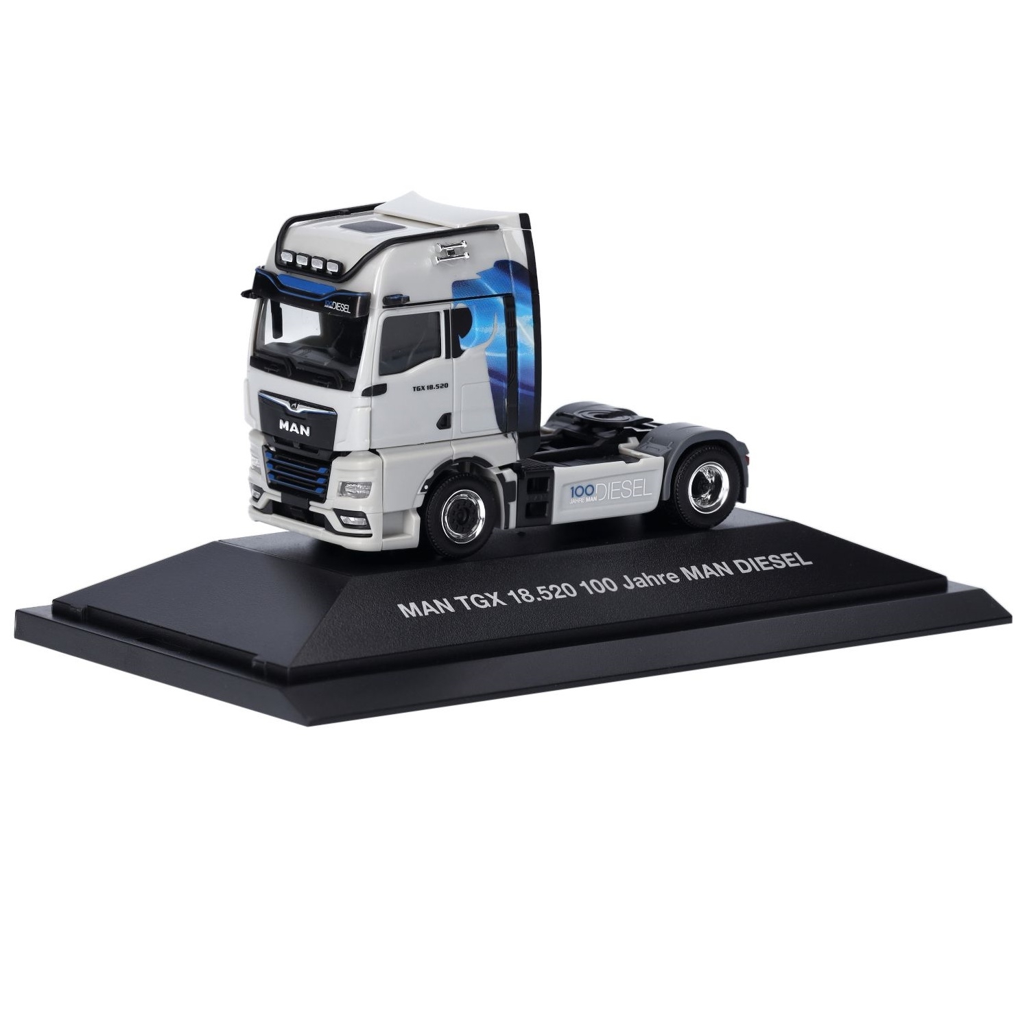 957403 - Herpa - MAN TGX GX 18.520 truck tractor "100 years MAN Diesel" agate grey  PC