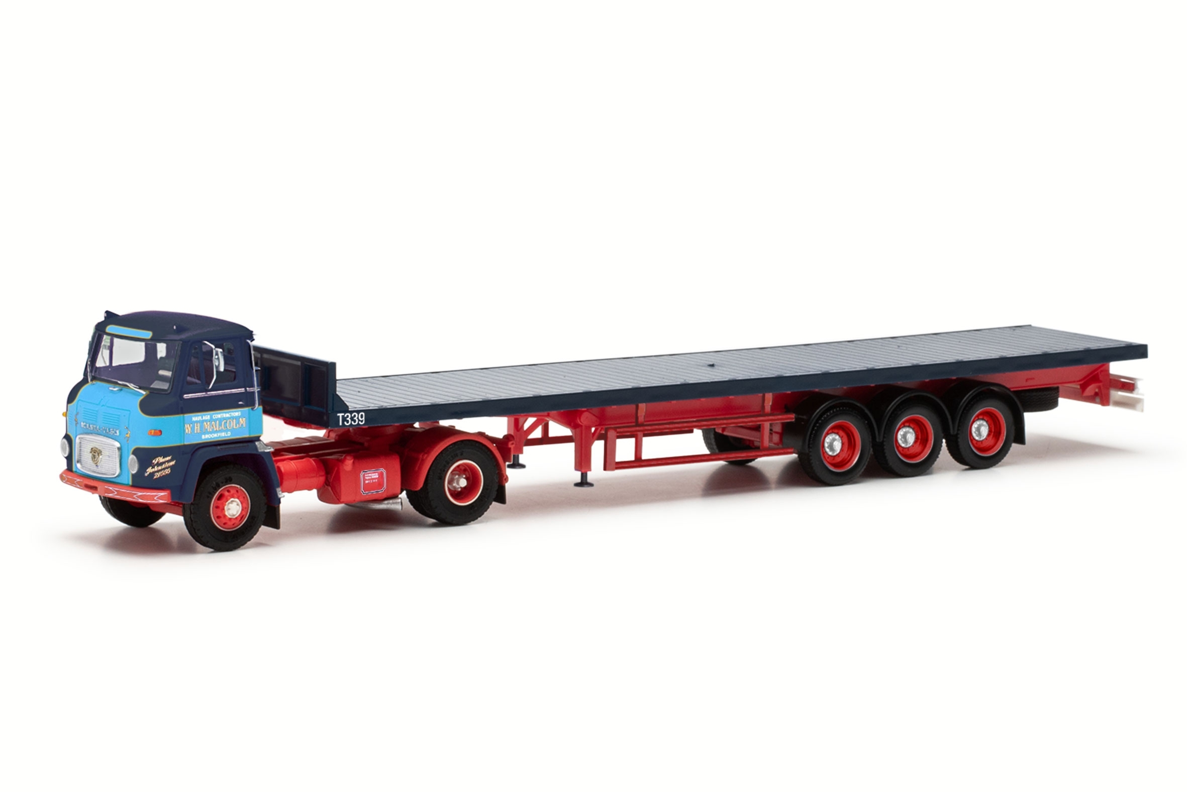 87MBS026499 - Herpa - Scania Vabis LB 76 kurz mit Flachbett-Auflieger "Malcolm" GB