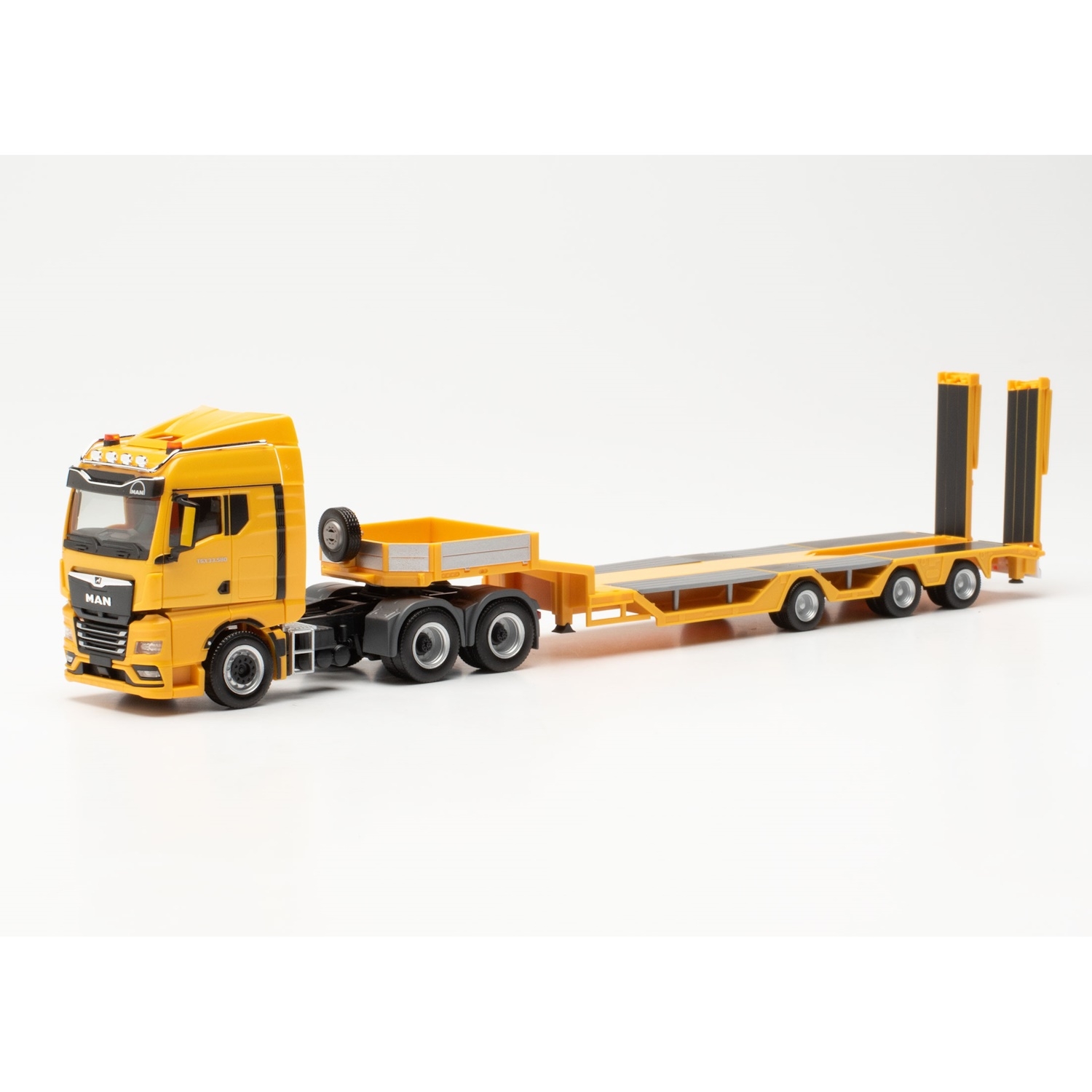 954679 - Herpa - MAN TGX GM 33.580 with Goldhofer Allrounder semitrailer, yellow