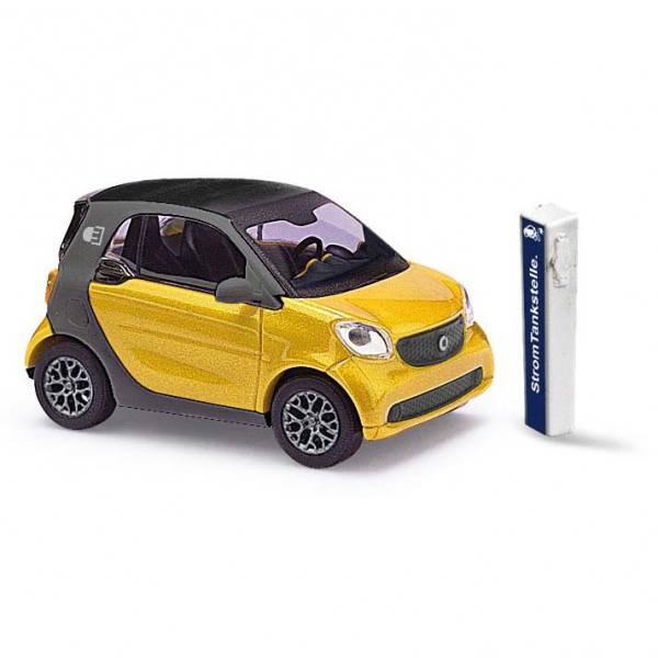 50724 - Busch - Smart Fortwo Coupe `14 "Electric Drive", gold metallic mit Ladesäule