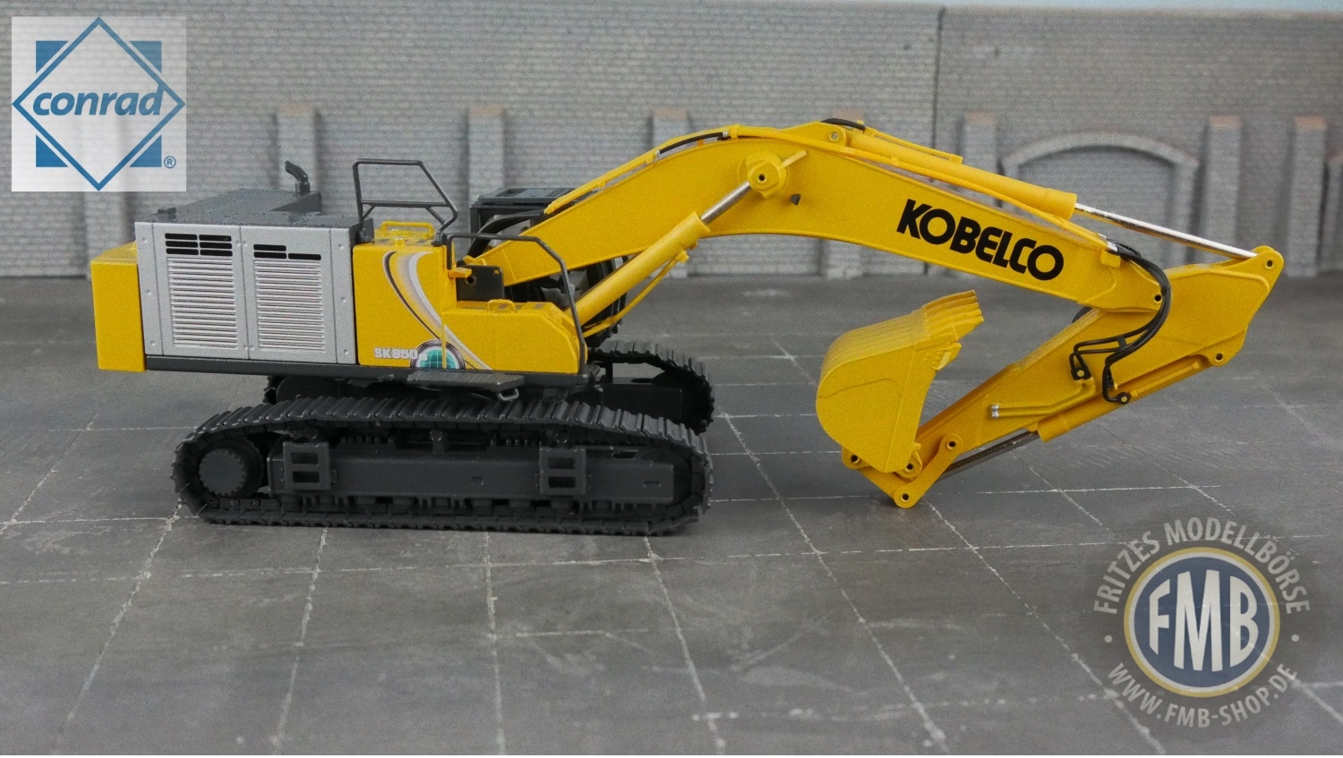 2219/01 - Conrad - Kobelco SK850 LC crawler excavator - yellow - US-Version  -